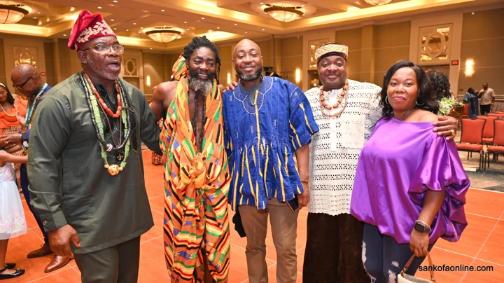 Guests posing together inside the convention venue