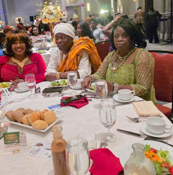Convention guests sharing a banquet table